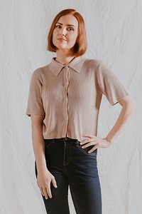 Happy woman in beige knitted shirt, portrait