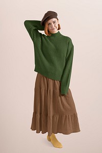 Woman in autumn outfits, green sweater rand brown dress