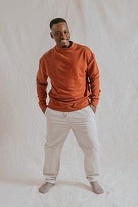 Cheerful man wearing orange long sleeve, autumn apparel fashion design