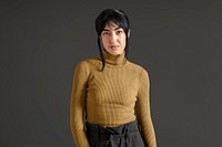 Mixed race woman wearing yellow turtleneck sweater, autumn apparel fashion design