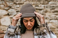 Woman wearing brown beanie, autumn fashion