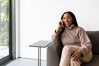 Woman talking on the phone in modern home