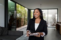 Real estate agent inspecting a house for sale