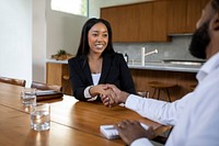 Real estate agent and client making a deal