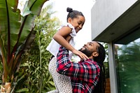 Happy father and daughter at home