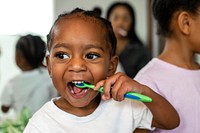 Boy brushing his teeth, dental & hygiene concept