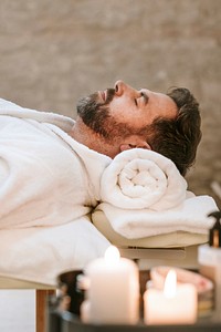 Man in spa salon, massage & beauty photo