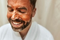 Man in facial mask, spa photo