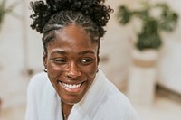 African American woman in bathrobe 