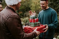 Friends exchanging Christmas gifts