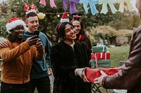 Friends exchanging Christmas gifts 