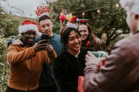 Friends exchanging Christmas gifts