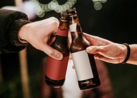 Hands toasting to celebrate at a Christmas party