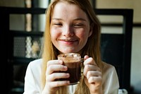 Young caucasian woman at a coffee shop