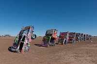 At the &rdquo;Cadillac Ranch&quot; along Old U.S. Route 66 outside Amarillo, Texas, visitors are encouraged to bring along a spray can to add a touch or two to the unusual public art installation.