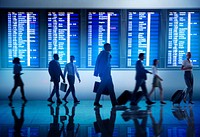 Silhouette of business people in an airport