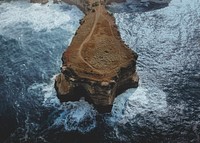 Cliffs among the blue Indian Ocean in Pacitan, Indonesia