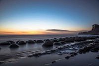 Rocky shore with a beautiful sunset