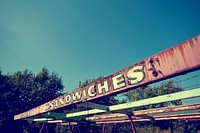 Old and rusty sandwiches signage