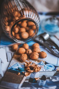 Jar of whole walnuts. Visit <a href="https://kaboompics.com/" target="_blank">Kaboompics</a> for more free images.