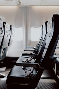 Row of seats on an airplane. Visit <a href="https://kaboompics.com/" target="_blank">Kaboompics</a> for more free images.