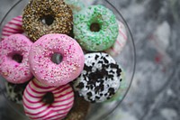 Plate of colorful donuts. Visit <a href="https://kaboompics.com/" target="_blank">Kaboompics</a> for more free images.