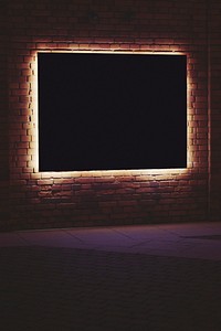Frame with lighting in a dark room. Visit <a href="https://kaboompics.com/" target="_blank">Kaboompics</a> for more free images.