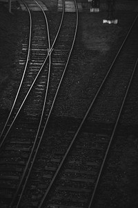 Dark railroad tracks. Visit <a href="https://kaboompics.com/" target="_blank">Kaboompics</a> for more free images.