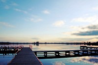 Wooden jetty at a lake. Visit <a href="https://kaboompics.com/" target="_blank">Kaboompics</a> for more free images.