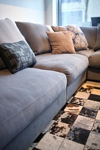 Comfortable gray sofa. Visit <a href="https://kaboompics.com/" target="_blank">Kaboompics</a> for more free images.