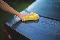 Man washing the car. Visit <a href="https://kaboompics.com/" target="_blank">Kaboompics</a> for more free images.