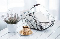Basket with books on a desk. Visit <a href="https://kaboompics.com/" target="_blank">Kaboompics</a> for more free images.