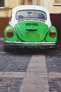 Green vintage car. Visit <a href="https://kaboompics.com/" target="_blank">Kaboompics</a> for more free images.