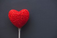 Red heart on a stick. Visit <a href="https://kaboompics.com/" target="_blank">Kaboompics</a> for more free images.