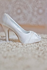 White bridal pumps. Visit Kaboompics for more free images.