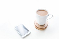 Cup of coffee and a phone. Visit <a href="https://kaboompics.com/" target="_blank">Kaboompics</a> for more free images.