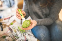 Woman painting an egg. Visit Kaboompics for more free images.