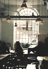 People sitting in a coffee shop. Visit <a href="https://kaboompics.com/" target="_blank">Kaboompics</a> for more free images.