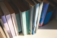 Row of colorful books. Visit <a href="https://kaboompics.com/" target="_blank">Kaboompics</a> for more free images.