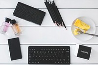 Black keyboard and stationary flat lay. Visit <a href="https://kaboompics.com/" target="_blank">Kaboompics</a> for more free images.
