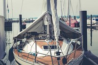 A luxury sailboat at a dock