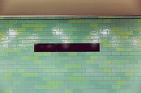 Wall with green tiles