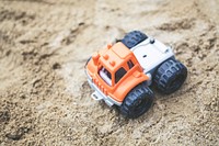 Car toy on sand in Erlangen, Germany