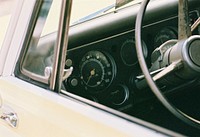 Through a window of a vintage car