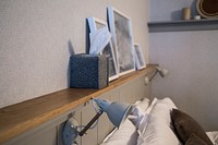 Shelf by the bed headboard