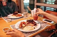 Friends having breakfast at a cafe