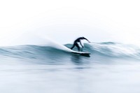 Surfer riding the waves