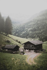 View of a mountain and rustic homes in the countryside