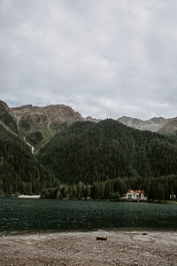 House by the lake near a mountain