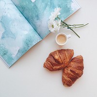 Croissants and coffee on a table